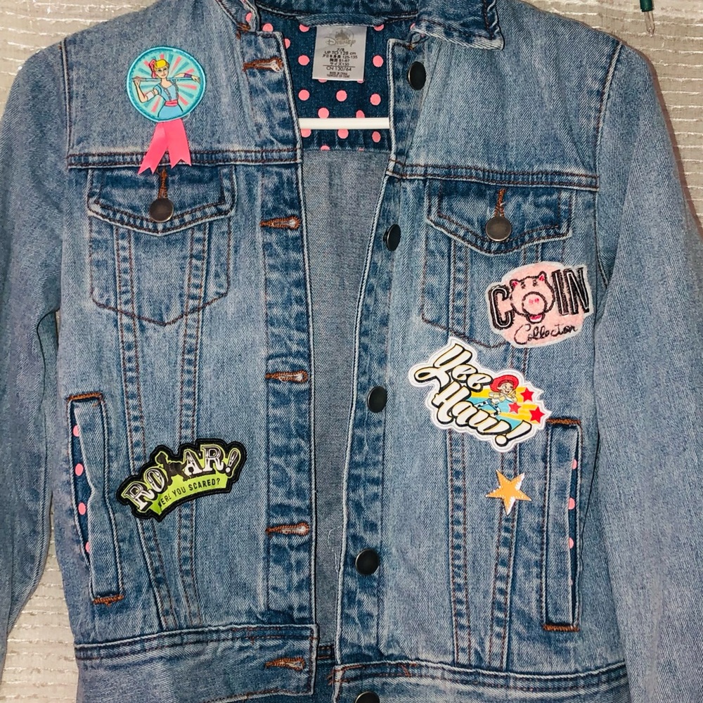 Girls Disney Toy Story patchwork denim jacket.